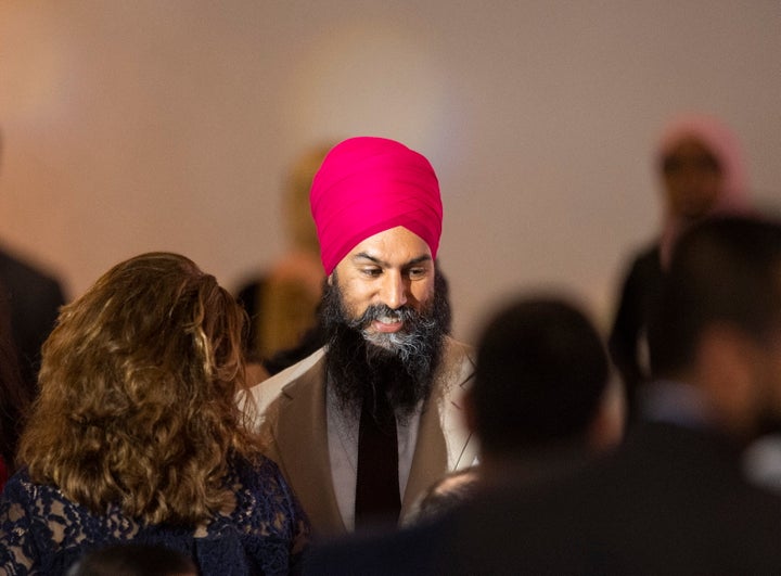 NDP Leader Jagmeet Singh talks to people during the Eid Dinner hosted by The Canadian-Muslim Vote in Toronto, on June 21, 2019.