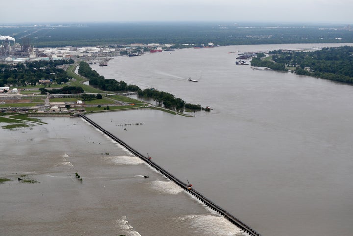 Workers open bays of the Bonnet Carre Spillway to divert rising water from the Mississippi River to Lake Pontchartrain, upriver from New Orleans on May 10, 2019.