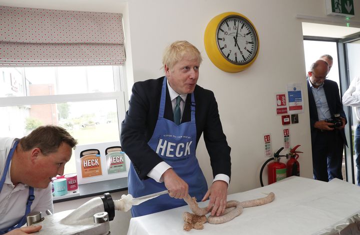 Conservative party leadership candidate Boris Johnson makes sausages during a visit to Heck Foods Ltd. headquarters near Bedale in North Yorkshire ahead of the latest hustings in York later.