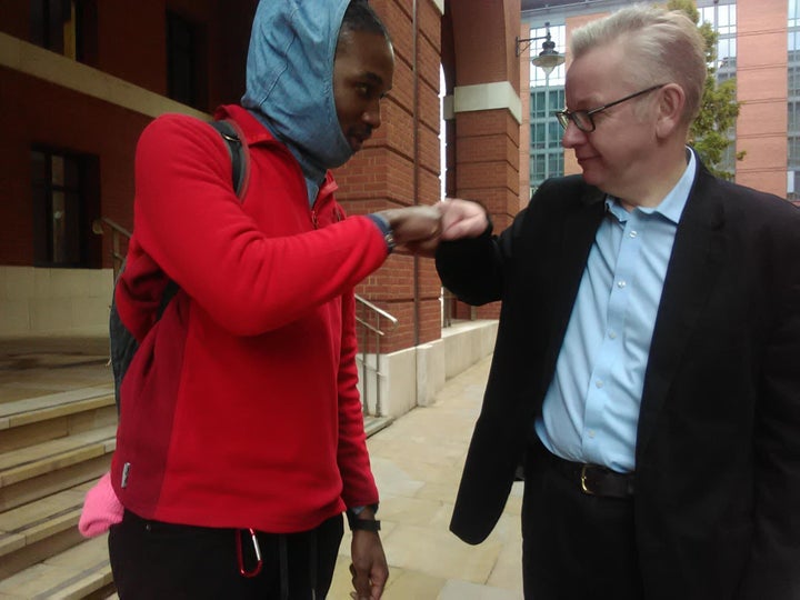 <strong>Chadwick Jackson engaging a friendly fist bump, or 'spud', with Michael Gove - Secretary of State for Environment, Food and Rural Affairs. </strong>