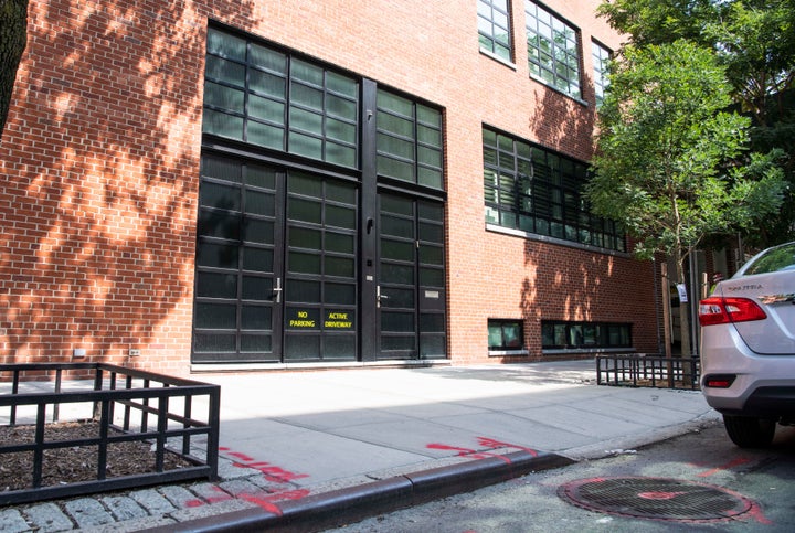 Noam Gottesman's compound shows a sidewalk curb has been whittled down to form a driveway ― and perhaps a parking space for t