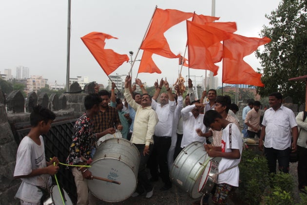 Maratha community members celebrate after Bombay High Court upheld the community's reservation last