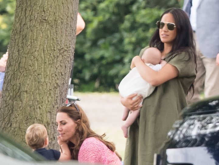 Kate and Meghan tending to their children. 