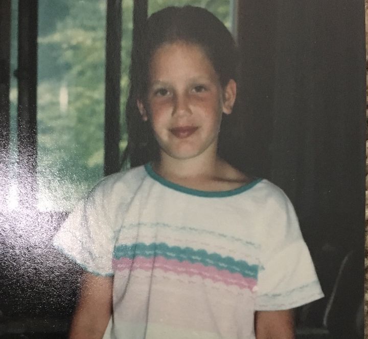 Lisa, pictured here around age 10, said she grew up with a loving and supportive family. She doesn't recall having body image issues as a kid or teen. 