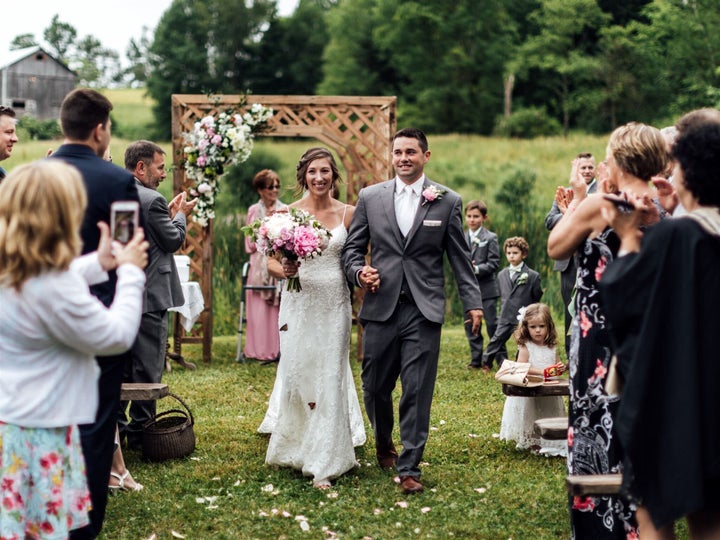 A few butterflies clung to Lydia's dress as she walked back up the aisle.