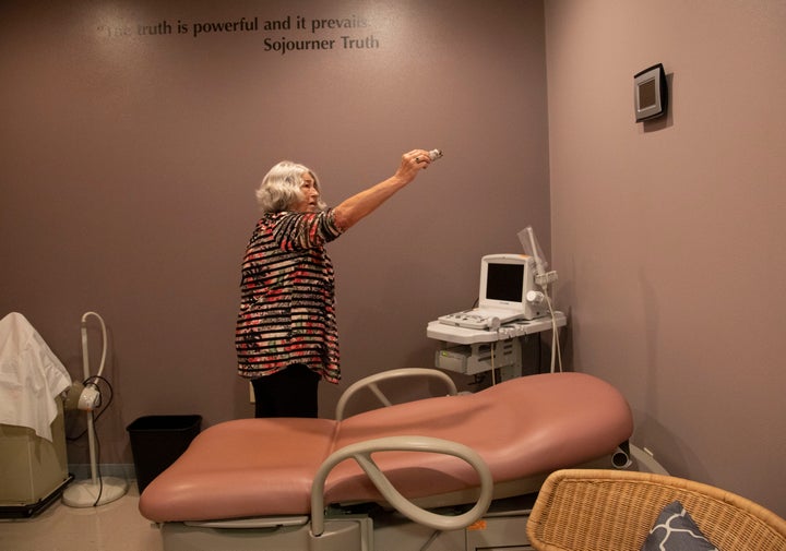 A number of clergy burned sage as they walked through the clinic's various rooms.