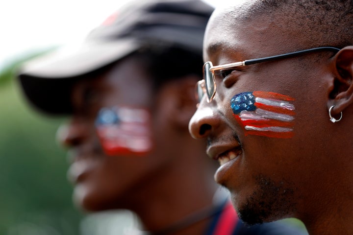 Asylum seekers from Angola attend a picnic for refugees, July 4, 2019, at Fort Williams Park in Cape Elizabeth, Maine. 