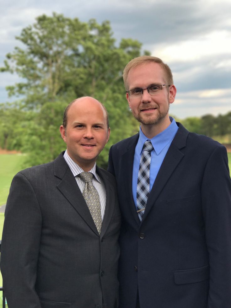 Joshua Payne-Elliott (right) and his husband, Layton Payne-Elliott, were both employed as Catholic school teachers in Indianapolis. Joshua Payne-Elliott was fired in June.
