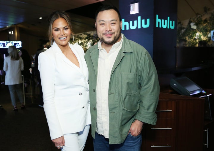 Chrissy Teigen and David Chang pose for a photo during the Hulu '19 Presentation at Hulu Theater on May 1 in New York City.