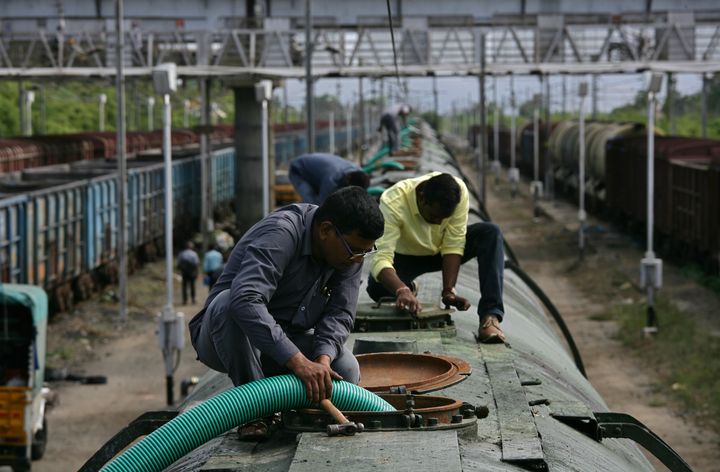 A worker fills a tanker train with water, which will be transported and supplied to drought-hit city of Chennai, at Jolarpettai railway station in Tamil Nadu, on 11 July 2019. 