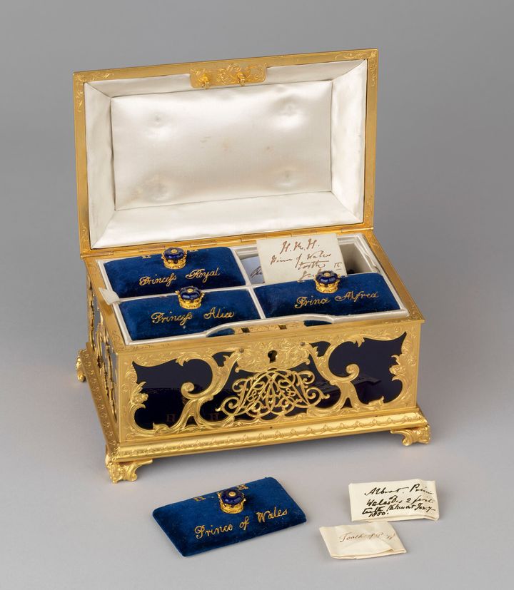 The Royal Collection Trust of a gilt-metal casket containing the teeth of Victoria's eldest children wrapped in paper