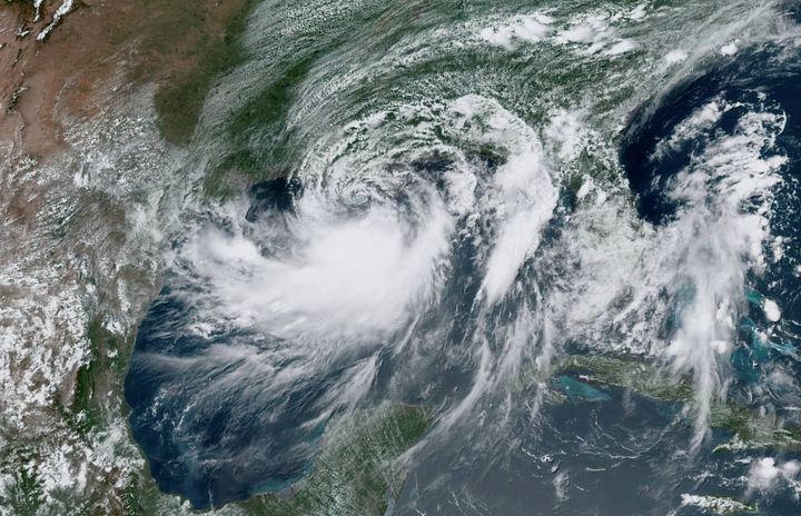 Tropical Storm Barry approaches the coast of Louisiana from the Gulf of Mexico in this July 12, 2019, satellite photo.