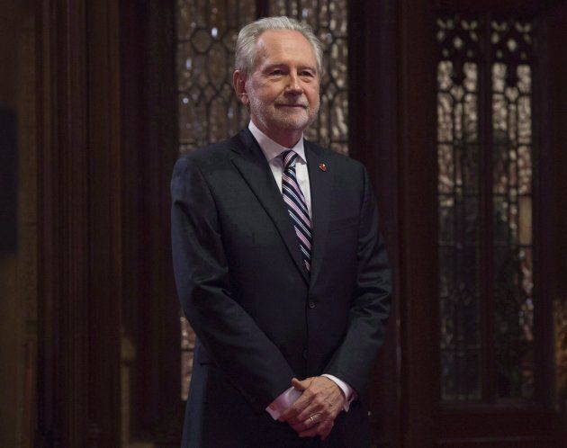 Sen. Peter Harder waits in the Senate lobby in Ottawa on Nov. 15, 2016.