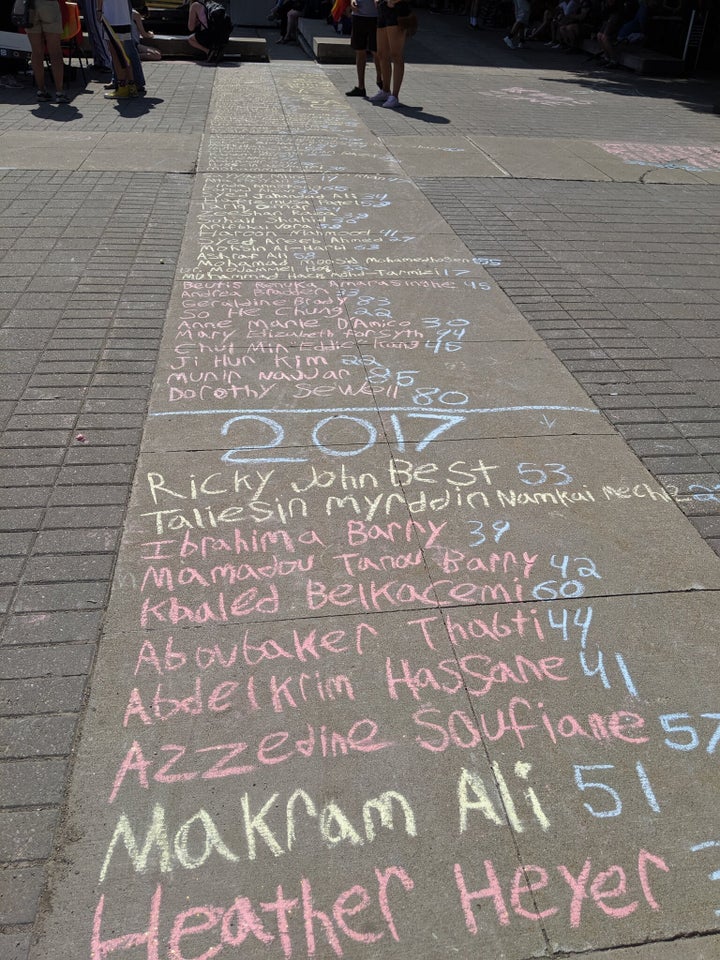 A list of people killed by fascists written in chalk on the forecourt of Hamilton City Hall on Saturday, July 13, 2019.