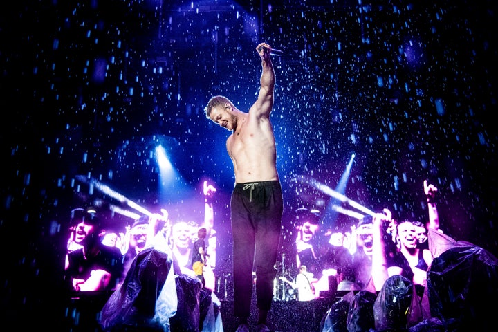 Dan Reynolds durant la courte prestation d'Imagine Dragons au Festival d'été de Québec, le 13 juillet 2019.