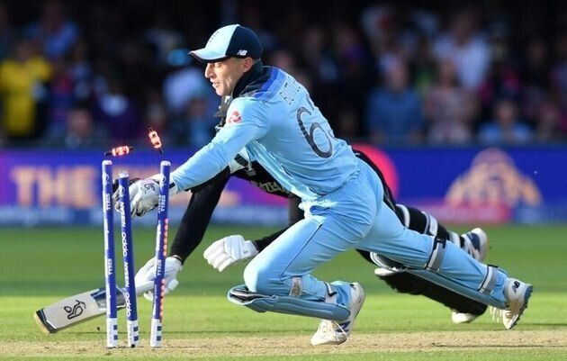 Jos Buttler runs out Martin Guptill in the super over to win the Cricket World Cup.