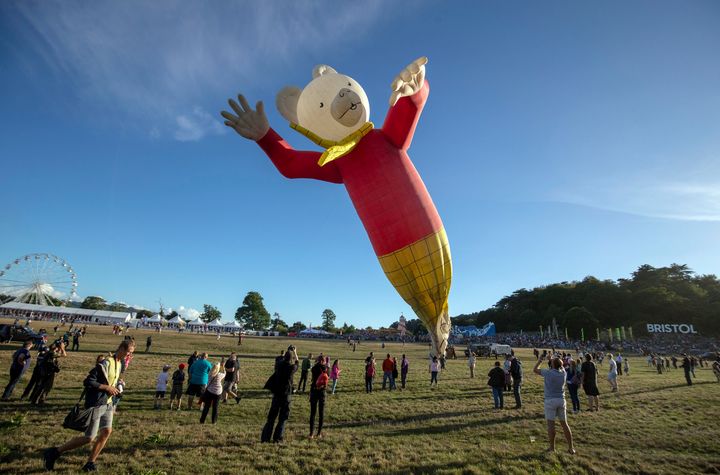 A Rupert balloon inflates at Bristol Balloon Fiesta in 2018