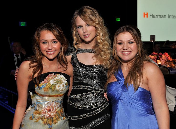 Miley Cyrus, Taylor Swift and Kelly Clarkson attend the 2009 Grammy's Salute To Industry Icons honoring Clive Davis on Feb. 7, 2009. 
