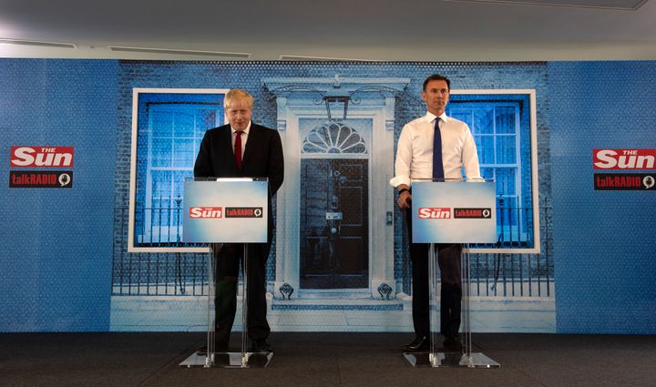 Conservative party leadership candidates Boris Johnson and Jeremy Hunt during a head-to-head debate hosted by The Sun at Talk Radio in London.