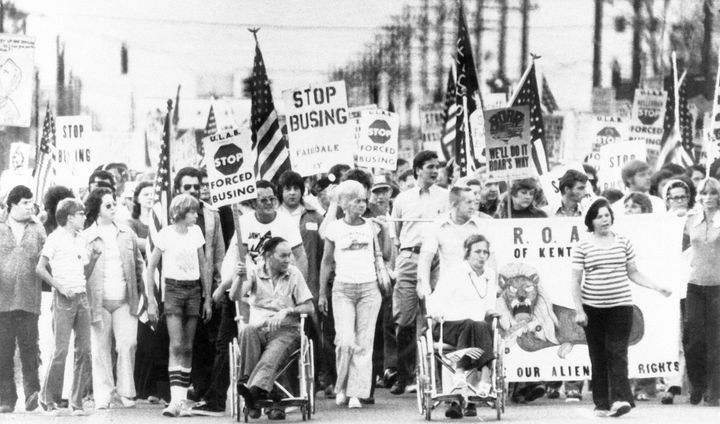 Protesters in southern Jefferson County, Kentucky, march against school desegregation on Aug. 31, 1976, the day before the start of the second year of court-ordered school busing.