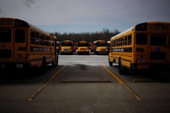 School buses at a compound for the Jefferson County Public Schools.
