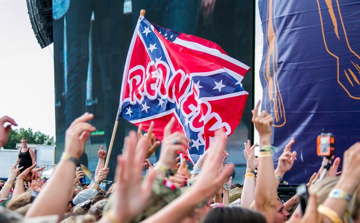 The Confederate flag waves in the air on Day 3 of the Faster Horses Festival at Michigan International Speedway on July 19, 2