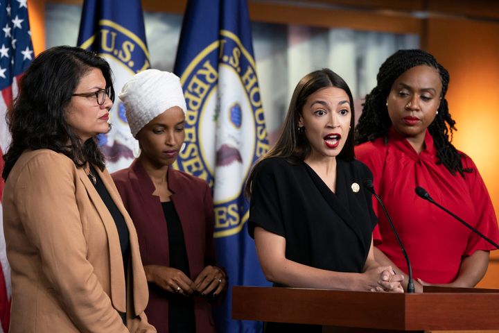 Rep. Alexandria Ocasio-Cortez (D-N.Y.), second from right, speaks alongside (from left) Reps. Rashida Tlaib (D-Mich.), Ilhan Omar (D-Minn.), and Ayanna Pressley (D-Mass.).