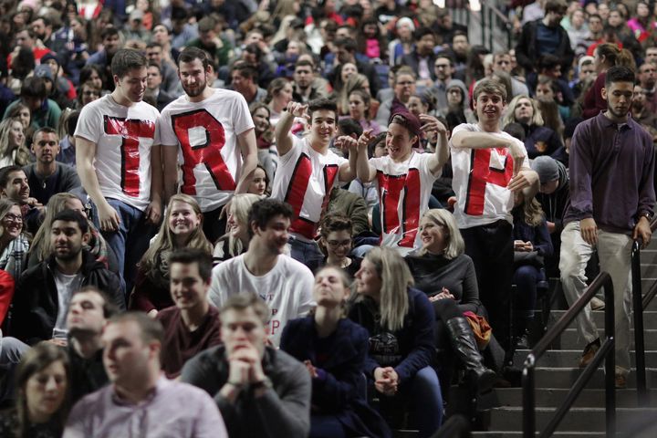 Liberty University students wear homemade T-shirts spelling "TRUMP" while waiting for the arrival of then-candidate Donald Trump during a campaign rally at Liberty University on Jan. 18, 2016, in Lynchburg, Virginia.