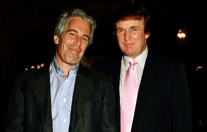 Jeffrey Epstein poses with Donald Trump at the Mar-a-Lago estate in Palm Beach, Florida, in 1997. Trump recently said he wasn't "a fan" of Epstein, as the financier faces child sex trafficking charges.