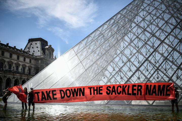 A protest outside the Louvre on July 1 condemned its ties with the Sackler family. The billionaire donors' highly addictive painkiller has been blamed for tens of thousands of deaths.
