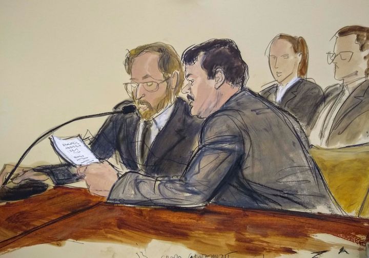 In this courtroom sketch, Joaquin "El Chapo" Guzman, foreground right, reads a statement through an interpreter during his sentencing in federal court, July 17, 2019, in New York. 