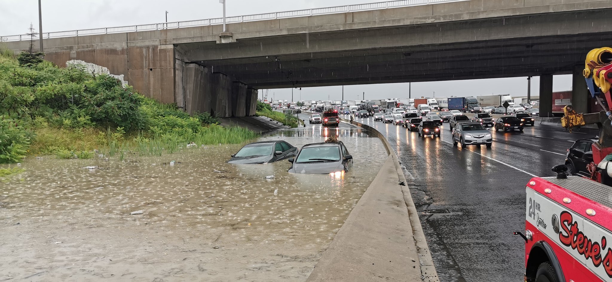 Toronto Roads Were Left Flooded After Intense Rain | HuffPost Video