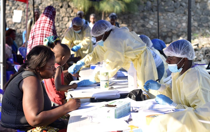 Congolese health workers collect data before administering ebola vaccines to civilians at the Himbi Health Centre in Goma, Democratic Republic of Congo, on July 17.