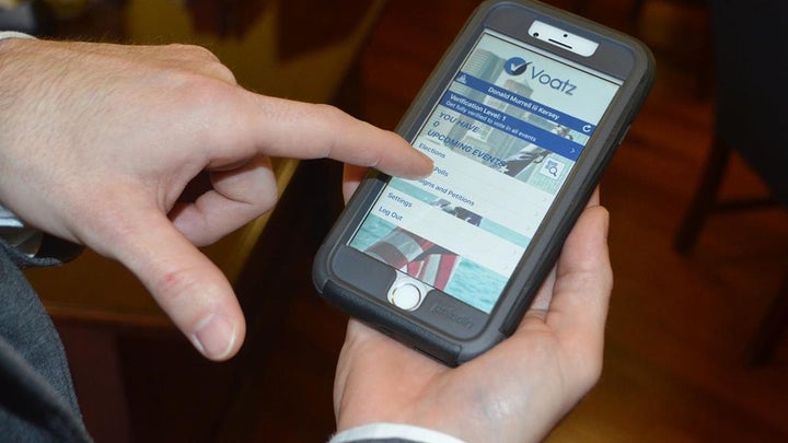 Overseas servicemembers from West Virginia and Denver voted using the smartphone app Voatz in the past year. Caucusgoers in Iowa and Nevada in February also will be able to vote by phone using a dial-in system.