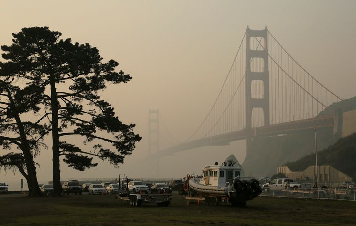 In this Nov. 16, 2018, file photo, the Golden Gate Bridge is obscured by smoke and haze from wildfires in this view from Fort Baker near Sausalito, Calif. 