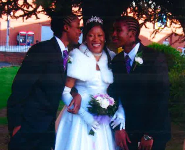 Chadwick [left] and brother share a tender moment at their sister's wedding