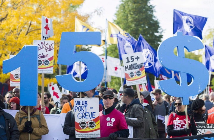 People gather in Montreal in 2016 to demand a $15 minimum wage. 