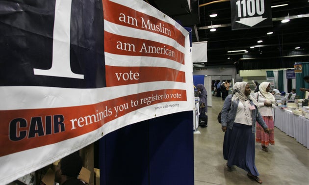 A sign at the 43rd annual Islamic Society of North America convention encourages participants to register...