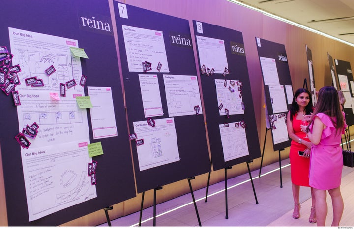 Attendees at the Reina Condos community consultation review the ideas board, July 11 in Toronto.