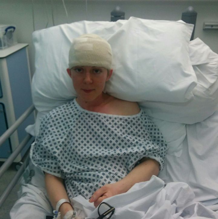 Sarah Gaffney-Lang in hospital after her "awake" brain surgery