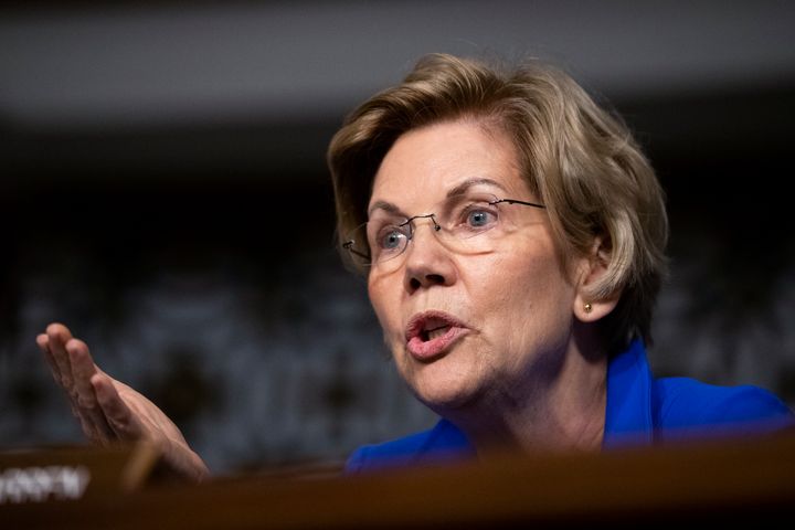 Democratic presidential candidate Elizabeth Warren is set to stand with protesting workers at a Washington area airport.