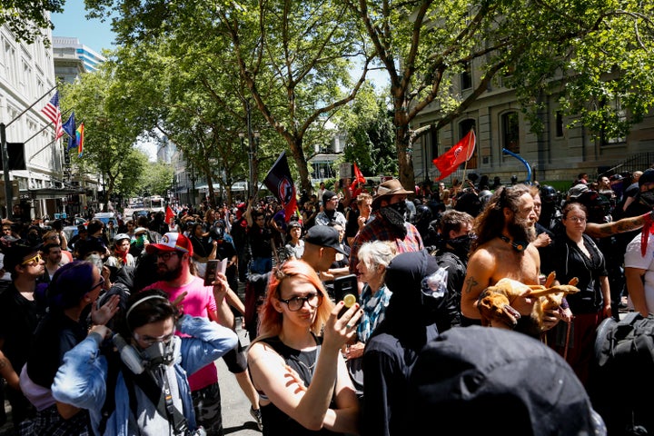 Counter protesters march ahead of Proud Boys demonstration in Portland, Oregon, last month.