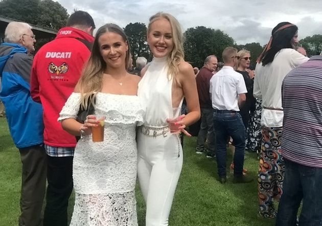 Woman Wearing White Jumpsuit Manages Surprising Comeback After Red Wine Disaster