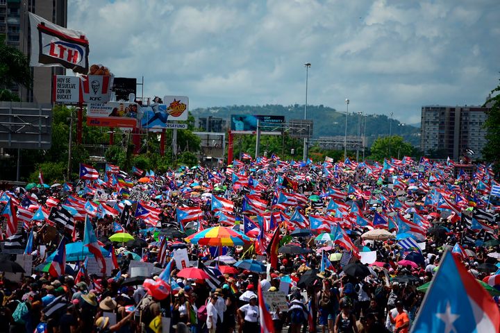 Thousands of Puerto Ricans gather in San Juan for what many are expecting to be one of the biggest protests ever seen in the U.S. territory, with irate islanders pledging to drive Gov. Ricardo Rossello from office.