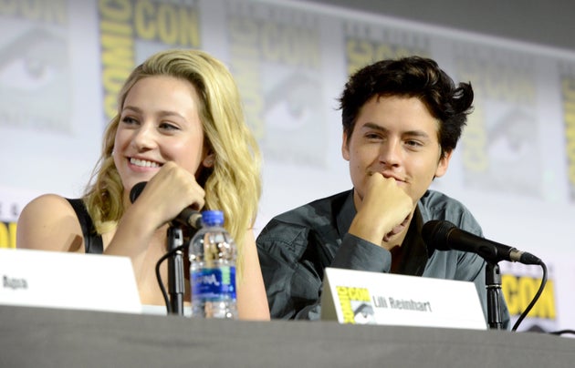 Cole Sprouse and Lili Reinhart attend a Comic-Con panel in San Diego over the