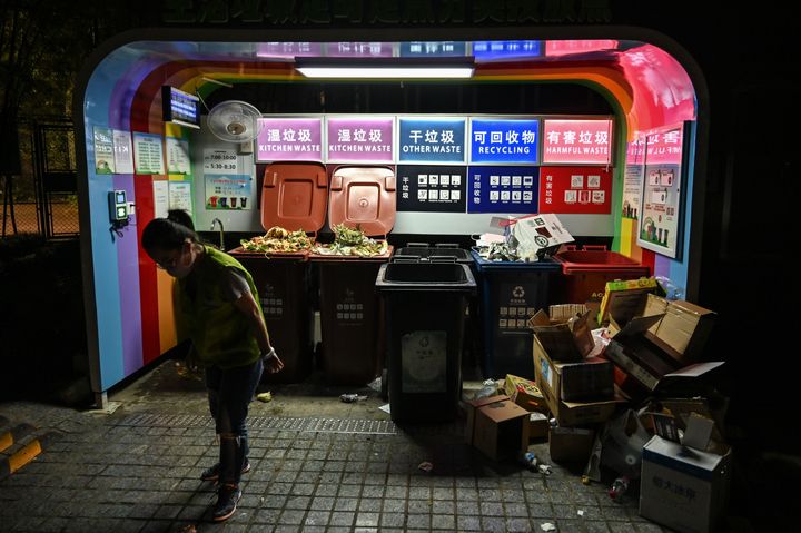 A color-coded trash sorting station in a residential area of Shanghai. New rules for separating different types of trash went into effect in the city on July 1. It's China's most ambitious garbage separation and recycling program ever.