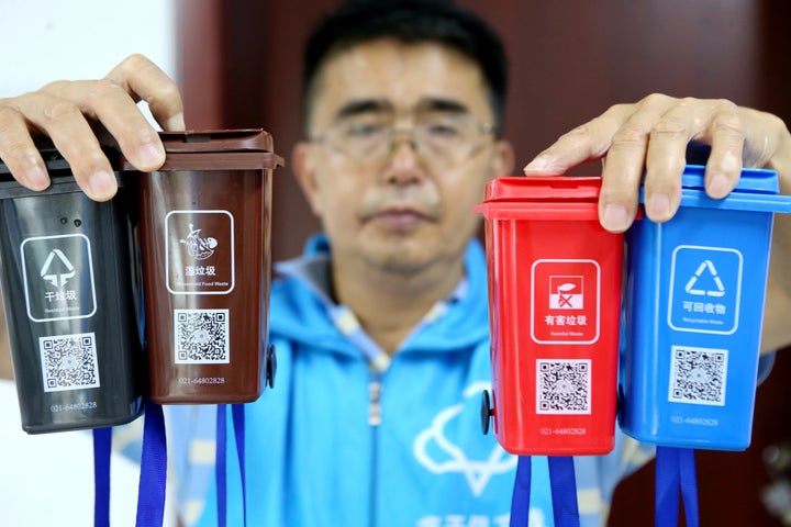 Miniature replicas of Shanghai's new waste-sorting bins were used to help locals learn the rules.