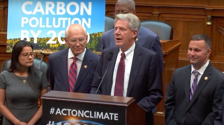 Members of the House Energy and Commerce Committee announce a goal of reaching net-zero carbon emissions by 2050 at a news conference Tuesday.