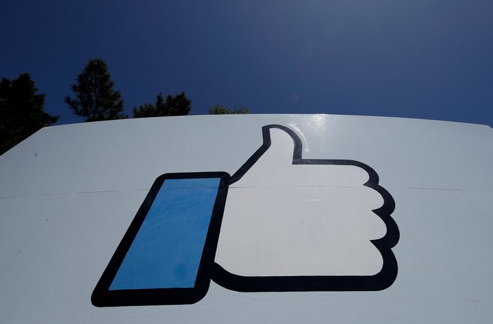 Facebook's thumbs-up Like logo is seen on a sign at Facebook's headquarters in Menlo Park, Calif.