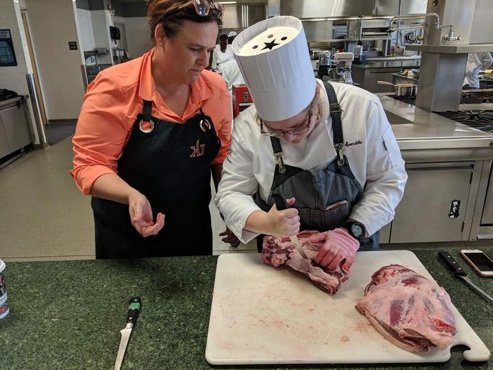 Underly, left, helped Julia Spondike learn the art of butchering.